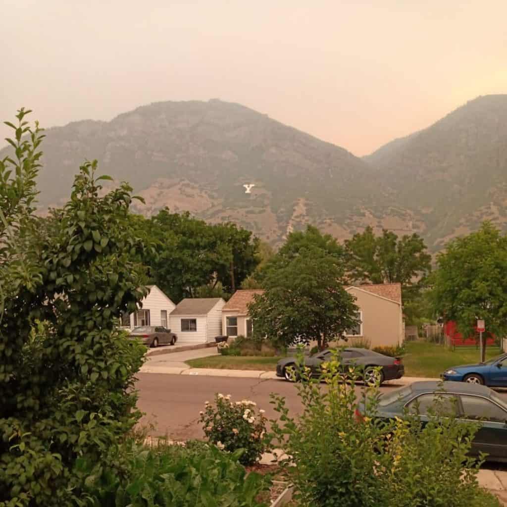 example of human needs pyramid air needs with Scott Bascom front yard with poor air quality from forest fire